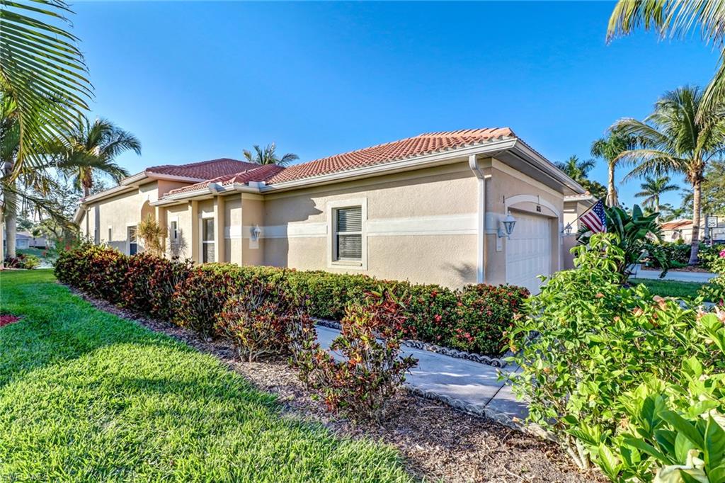 Enjoy a stunning lake view in this fabulous 3 bedroom 2 bath villa with a 2 car garage!  This villa lives like a single family home, yet offers the low maintenance lifestyle of a condo.  An open, spacious floor plan, neutral colors, vaulted ceilings, and screened lanai are just a few of the features of this fabulous home.  The Sanctuary at Blue Heron residents enjoy a clubhouse with pool, tennis/pickleball court, exercise room, activities and so much more!  Blue Heron is conveniently located to restaurants, shopping, 75 and just minutes to Naples' award winning beaches.