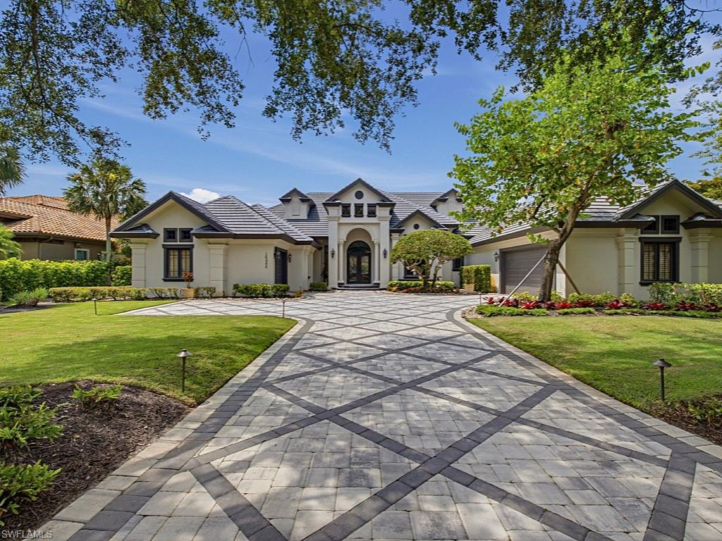 One or more photo(s) has been virtually staged, AI generated or rendered.  As you step through the grand entrance of 16488 Felicita Ct, you are immediately welcomed into an atmosphere of refined elegance where soaring, volume ceilings and premium finishes set the stage for a truly luxurious living experience. This exceptional home in Mediterra invites you to explore its seamless, open-concept floor plan, beginning with a grand foyer that leads into a sophisticated living room and a tastefully appointed formal dining room that effortlessly flows toward the light-filled family room and kitchen that offers a Wolf gas range with dual ovens, a Subzero refrigerator & freezer, a reverse-osmosis water filtration system, sizeable island and a walk-in pantry. In the sunlit family room beyond the zero-corner sliders, your private outdoor resort unfolds: a sprawling covered lanai boasting numerous luxury upgrades awaits. This outdoor paradise features a resurfaced pool with new fountains, fire bowls, and even a playful dolphin water feature, along with an expansive Quartz-topped bar, equipped with a Lynx gas grill, two refrigerated drawers, a mini-fridge, ice maker, Kalamazoo Artisan Fire pizza oven, Evo flat-top grill, warming drawer, new custom cabinetry & lighting fixtures. Entertain guests with ease, thanks to the ample bar and dining seating, pool bath, and a stunning see-through fireplace with multi-color lighting effects and a drop-down TV. The entire outdoor experience is highlighted by new tile installation across the entire lanai deck, fireplace, pool & spa. The owner’s suite is a luxurious private retreat that opens directly to the lanai and includes a dedicated office/sitting area, two sizeable walk-in closets, dual vanities, and a spa-inspired bathroom that includes a spacious walk-in shower, a separate soaking tub overlooking an enclosed garden area and even a bonus sitting room or fitness room. The residence additionally has three en-suite bedrooms for family or guests, a large laundry room with a washer and dryer replaced in 2021, and a three-car garage. With a new 2025 roof, fresh exterior paint, a new 2025 paver driveway with front stoop/steps, and updated landscaping and sod completed in 2024-2025, this home is truly move-in ready!