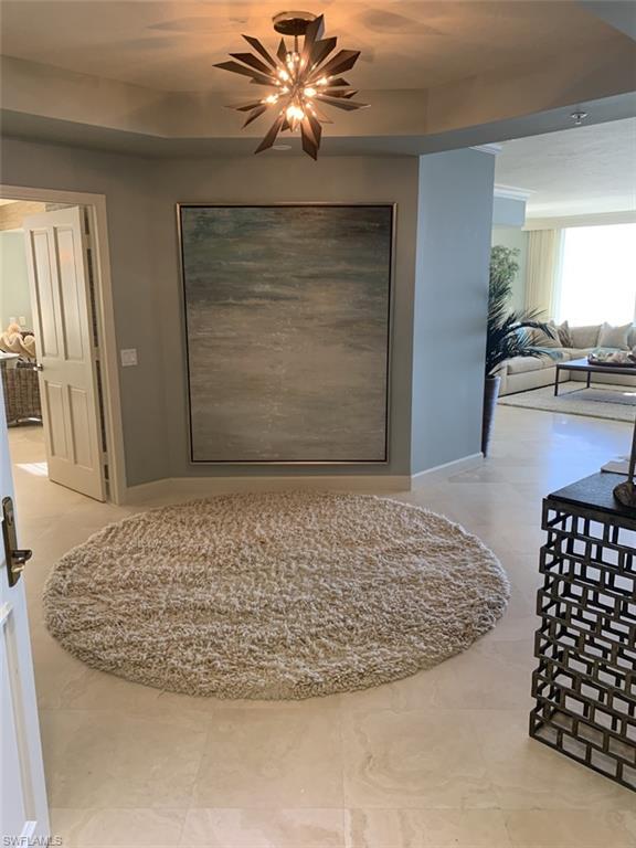 A rare 3 bedroom - 3.5 bath luxury 3,380 sq ft condo directly overlooking the gulf in the Brighton complex in Bay Colony (8231 Bay Colony).

There are no other Brighton condos available on the market.

Updated & freshly painted DELUXE BEACHFRONT South and West corner Jewel showcasing 18 x 18 honed Saturnia marble flooring, completely renovated chef's kitchen and master bath. Be surrounded in the comfort of this casually elegant gem with fine interior detailing. Enjoy the inviting Gulf-Side open air glass-railed West facing lanai from the living, breakfast and very important Master Suite or gather in the family room/den opening to a pleasant screened lanai, perfect for morning coffee. Master bedroom offers stunning south and west Gulf views. Double French doors lead to the sumptuous master bath, offering etched glass shower wall detail, natural stone and marble, plus walk-in custom closet finishes, complete with granite topped his/her dresser. Two en-suite guest bedrooms share a third East facing screened lanai, sure to spoil your family or guests. Brighton is a full-service building, with 24-hour front desk personnel, live-in Resident Manager, social, library and fitness.