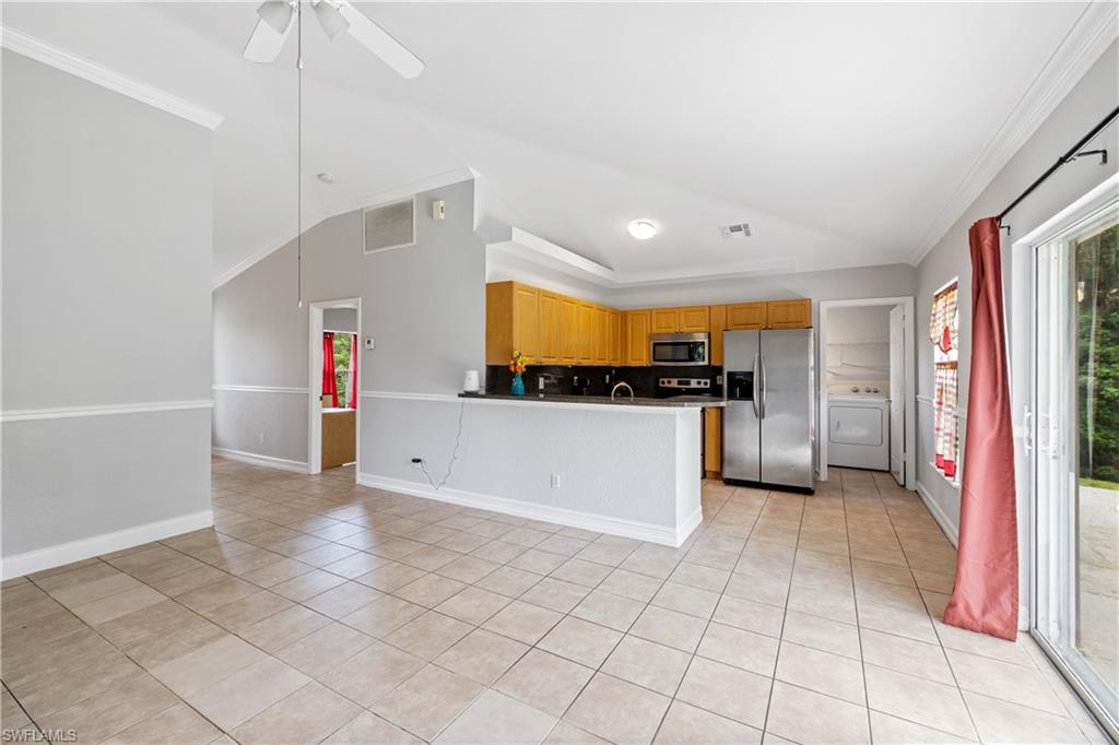 You will want to make this beautiful home YOURS when you see the split floor plan, soaring vaulted ceilings, and ALL TILE floors! FRESHLY Painted inside and exterior areas have been pressure washed. Built in 2003 and located 2 Streets away from Everglades Blvd/Oil Well Intersection is what makes this a SMART and CONVENIENT Choice! Newer AC and Water Heater. NO HOA FEES - NO RULES! Live Freely! Come visit this home and make it yours TODAY!