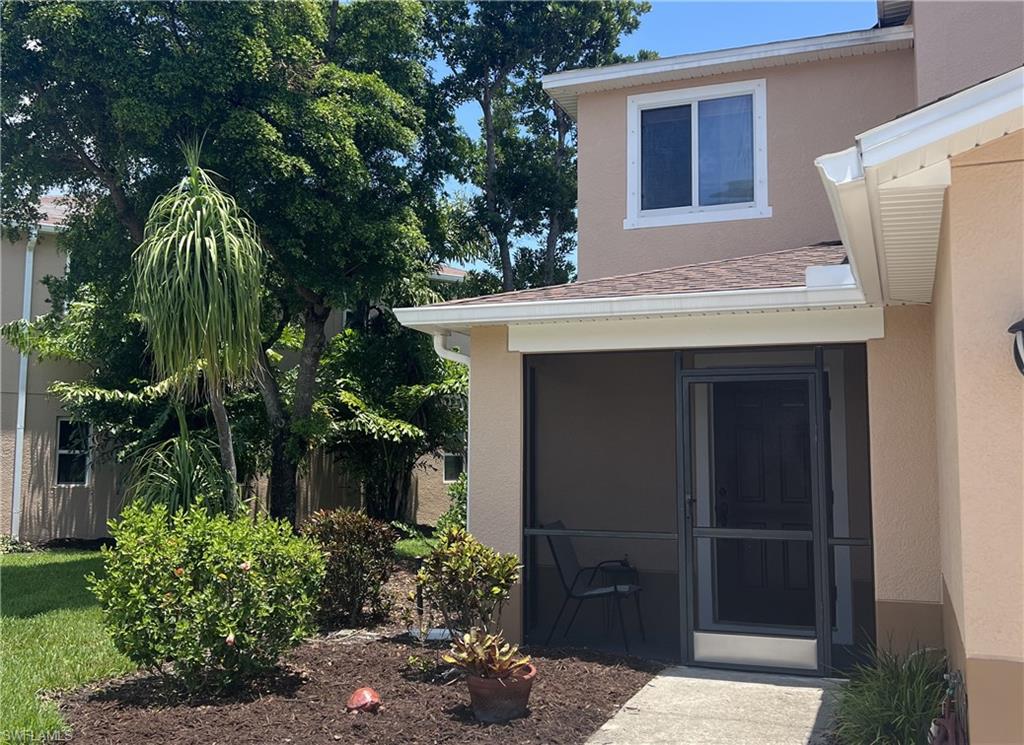 Welcome home to your beautiful lake-front town home in the desirable gated Bayshore Commons community situated in an ideal location with just a short walk to Publix and provides easy access to I75, downtown Fort Myers River District, designer shopping, restaurants, airports, healthcare, and more. This spacious townhome has an open floor plan downstairs with a split bedroom design upstairs. This home has been meticulously maintained. This is a premium end unit with an abundance of natural light. Your rear sliding doors offer gorgeous lake views and easy access for fishing while enjoying beautiful sunrises. Updated features include: a new roof, new AC unit, new hot water heater, and new plank laminate flooring downstairs. Other enjoyable features are plush carpet upstairs, a breakfast bar, screened-in porch, and an extra wide driveway. The elegant and spacious clubhouse is available for gatherings where you can enjoy the large lake-side heated pool. This community offers low HOA fees with landscape maintenance, pool maintenance, sewer, water, and trash pickup included. There is no history of flooding at this home. Whether you are in search of the perfect winter getaway or your perfect palm tree paradise, you will be amazed to call this unit home! All information deemed reliable but not guaranteed. Buyers to do due diligence.