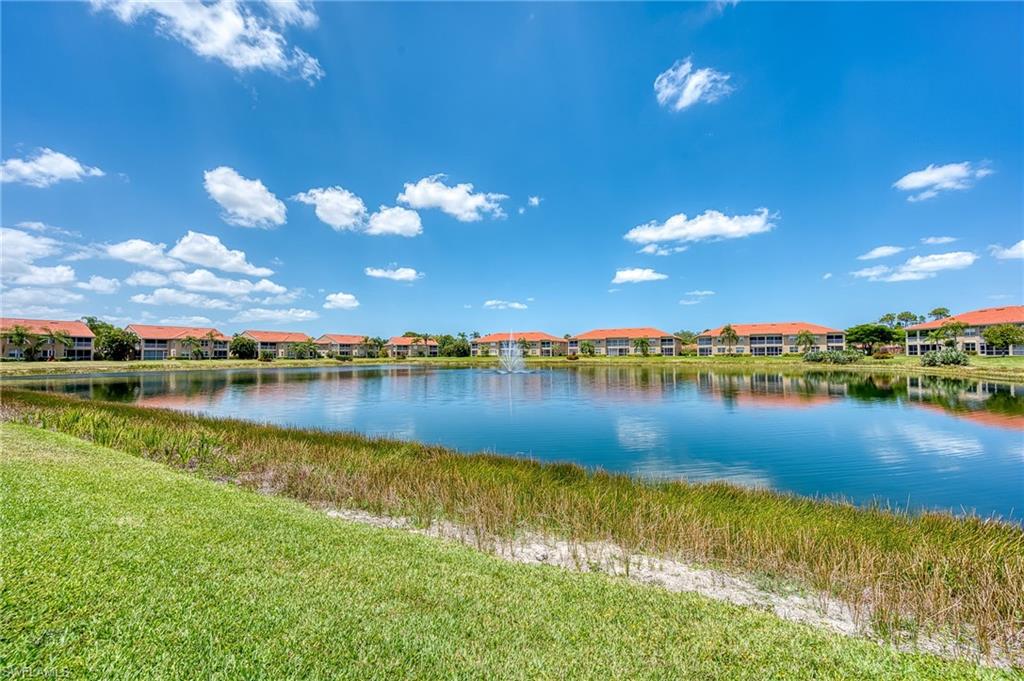 Light and bright, clean and comfortable, first floor lakeside condo in desirable North Naples community of Huntington Lakes!  Updated kitchen.  Plantation shutters.  Roomy garage.  Crown mouldings.  Freshly painted.  Tile floors throughout.  New AC installed in October 2022.  Roof replaced after Irma.  Impact windows and sliders are coming at no cost to buyer.  Extra storage closet.  This community has tennis, bocce, 3 swimming pools, spa, sauna, many activities.  Seven miles to the gulf.  20 minutes to downtown.  20 minutes to RSW.  Restaurants, grocery stores, shopping, and entertainment are all nearby.  You are going to love it here!