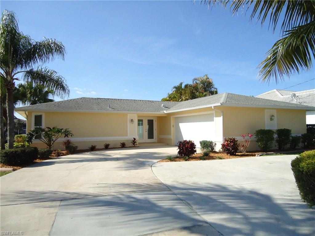 Completely renovated  Direct Access pool home with southern exposure on a 200+ wide canal located in the very desirable Orchid section of the Cape. Only a few minutes to the river. Intense renovation includes, New Kitchen with wood cabinets, granite, stainless appliances. Beautiful bathrooms, large master with walk-in closets, tile throughout entire home, New a/c system including all duct work, Pool has been refinished, new paver deck installed, new screens on entire screen cage, new impact windows, impact wind rated garage door. Boat dock with 10,000 lb aluminum boat lift.  This home is ready for you. Make an appointment to see this Beautiful home! 





 Multi-million dollar homes in the area and at the end of the cul de sac.