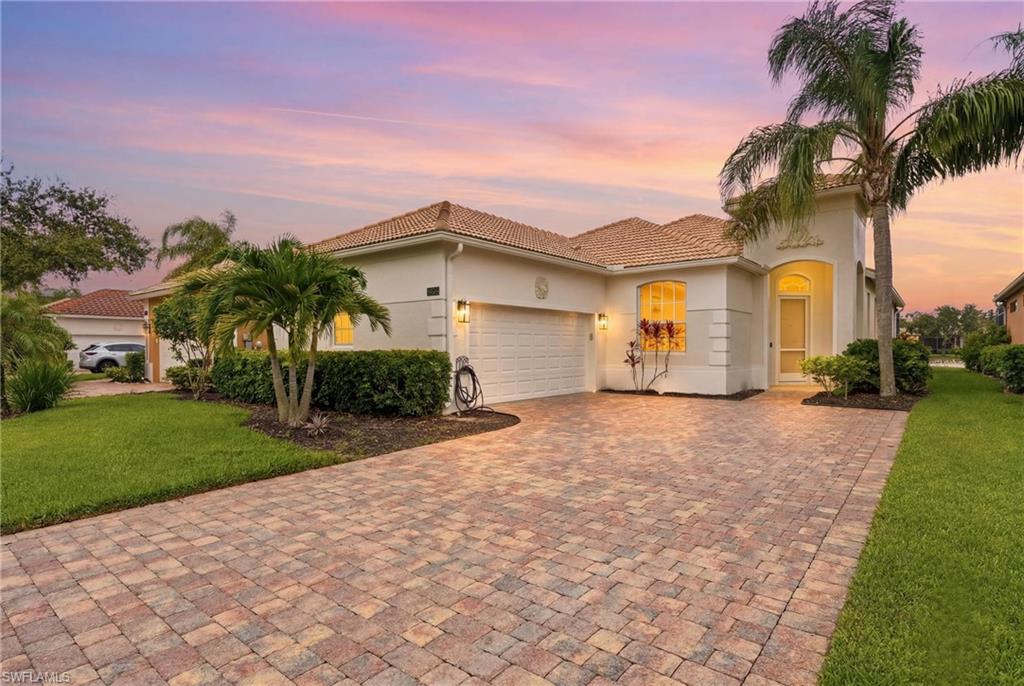 Experience the quintessential Florida lifestyle in this stunning residence at *15464 Cortona Way*, where elegant design, thoughtful upgrades, and breathtaking lake views come together in one exceptional home.
From the moment you step inside, soaring just over 12-foot ceilings and an abundance of natural light create a bright, open atmosphere that immediately draws your eye to the tranquil water views beyond. Freshly enhanced with a newly painted exterior, this home offers outstanding curb appeal and a fresh look.
Designed for both everyday living and entertaining, the heart of the home is the beautifully renovated kitchen featuring brand-new quartz countertops, a stylish tile backsplash, and samsung stainless steel appliances. The original two-tier breakfast bar has been reconfigured into a single-level quartz, creating a cleaner, more open design that's perfect for entertaining and everyday living. The kitchen flows seamlessly into the spacious living and dining areas, where custom woodwork in the dining room and a striking feature wall in the great room add warmth and contemporary character. Offering exceptional flexibility, the dedicated office includes a closet and easily functions as a true fourth bedroom, making it ideal for guests, a home office, or growing families.
Indoor and outdoor living blend effortlessly through expansive sliding glass doors that open to the screened lanai. Enjoy the coveted southern rear exposure, filling the private pool with sunshine throughout the day while overlooking peaceful lake views. The spacious lanai provides the perfect setting for relaxing, entertaining, or simply enjoying Southwest Florida's year-round outdoor lifestyle. For added peace of mind, the home is equipped with hurricane-impact windows and accordion hurricane shutters protecting the lanai. Additional features include a spacious two-car garage with epoxy flooring, storage above, and an addition refrigerator. Located within the highly desirable Tuscany Cove, residents enjoy an impressive collection of resort-style amenities, including a 7,000-square-foot clubhouse, resort-style pool and spa, children's splash pool, fitness center, tennis and pickleball courts, basketball court, playground, and scenic walking paths. One of the community's most sought-after features is its private rear resident gate offering direct access to Founders Square , providing convenient access to popular restaurants, shopping, fitness studios, entertainment, and everyday conveniences. This exceptional home combines luxury, comfort, and an unbeatable North Naples location—offering the very best of refined Florida living.