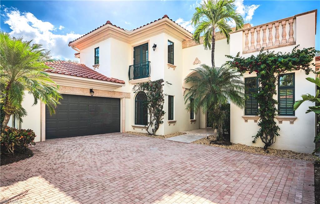 Experience the pinnacle of resort-style living in the highly sought-after Grey Oaks community with this breathtaking, fully updated 2-story residence in the exclusive Avila at Grey Oaks. Just a short walk from the clubhouse, community amenities, and engaging activities, this home combines luxury, comfort, and convenience in an unparalleled setting. The meticulously redesigned floor plan offers a seamless flow between the formal living room and the inviting family room, where abundant natural light pours through new hurricane-impact sliders, creating an atmosphere of warmth and sophistication. The open-concept design ensures an ideal space for both everyday living and entertaining. Step outside to the spacious screened lanai, where a newly renovated pool and spa with Southwestern exposure provide a tranquil oasis. The outdoor space is a true highlight, featuring elegant pavers, artificial turf, landscape lighting, and a beautifully refreshed landscape. An exquisite outdoor kitchen offers the perfect spot for al fresco dining, making this the ultimate retreat for relaxation and entertaining. The expansive master suite, along with a versatile 5th bedroom/den, is conveniently located on the first floor, providing privacy and convenience. Upstairs, three generously sized bedrooms offer ample space for family and guests. Every detail has been thoughtfully considered. Recent upgrades include two new A/C units, a tankless hot water heater, New plumbing, and new upgraded pool equipment, complete with new tile and finishes. Inside, the home boasts a chef’s kitchen with sleek new cabinets, hardware, countertops, backsplashes, and high-end Subzero and Wolf appliances. The bathrooms have been transformed with new plumbing fixtures, elegant tile work, and designer finishes, while new wood floors, custom trim, stylish light fixtures, LED lighting and a newly crafted staircase add sophistication throughout the home. Custom closet build-outs offer a refined touch and added storage space. At Grey Oaks Country Club, you’ll enjoy unparalleled amenities including 54 holes of championship golf, a newly renovated wellness center, a lagoon-style pool, tennis, pickleball, bocce, and gourmet dining options, all just minutes from downtown Naples' world-class shopping, fine dining, and pristine white sand beaches. This fully updated home offers the ultimate in luxury living—schedule a showing today to experience it for yourself.