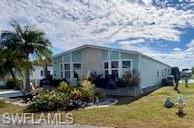 Welcome to 472 Sharks Point in the prestigious Harbor Isles, a premier 55+ community in North Port, FL! This beautifully updated 3-bedroom, 2-bath home features a spacious split floor plan. The master bedroom has room for an office. The master bath has a brand-new tile shower, dual sinks, and custom cabinetry. Plus, there’s a convenient washer and dryer hookup in the master bath. The home is loaded with upgrades, including new subfloors and flooring throughout, fresh half-inch drywall, modern lighting, new electrical, custom window treatments and a 52-inch ceiling fan in the main living area, with new ceiling fans in every bedroom. Enjoy the new kitchen countertops, Samsung smart appliances and New stove that bakes, dehydrates, air fryer, broil and toast. The resurfaced cabinets with modern hardware,new countertops in kitchen/dining increases the appeal. The home is bright and airy, featuring updated lighting, skylights, and a fireplace. The expansive, hurricane-proof lanai features a Dolphin Lake view. This home is definitely a crowd pleaser and is perfect for entertaining. The property also boasts a brand-new hurricane-vented roof with a 25-year transferable warranty. New Air HVAC with 5 year warranty, Plus, you’ll enjoy the catch-and-release Dolphin lake, right in your backyard, offering million-dollar views of sunrise and sunset. Harbor Isles is well-known for its wide range of amenities and active lifestyle. The community features: swimming pool and spa, a fitness center, pickle ball courts, marina with access to the Gulf, billiards, bocce ball, shuffleboard, clubhouse. Residents enjoy well-maintained grounds, and waterfront views, like the Dolphin Lake. North Port itself is known for its proximity to Gulf Coast beaches. It offers a relaxed lifestyle while still being close to amenities like shopping, dining, and healthcare. It’s also conveniently located near larger cities like Sarasota and Venice, making it a great spot for both relaxation and convenience.