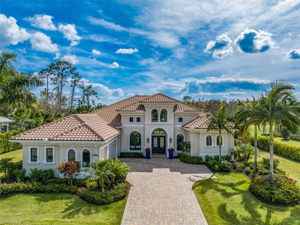 Immediate Golf Membership Available! Jump the waitlist with newest built resale in Quail West. The open floor plan offers several areas to entertain whether it be the formal living room, spacious great room or covered lanai. With South facing views over the 8th hole with the Preserve course you'll enjoy basking in the Florida sun while maintaining coveted privacy as the cart path winds on the opposing side of the Par 4 fairway. Multiple seating areas adorn the expansive lanai which is fitted with an outdoor kitchen, fire pit table, panoramic screens and hurricane shutters. The primary suite offers walk-in his & her closets, a soaking tub, open shower and French doors which provide direct access to the pool. High end finishes amongst a minimalist environment offer the relaxing move-in ready opportunity for the seasonal or annual buyer. Keep your own golf cart in one of the 3 garage bays, so you can quickly access 8 tennis and 4 pickleball courts, 3 dining options, 2 story fitness center and 36 holes of Arthur Hills designed golf!