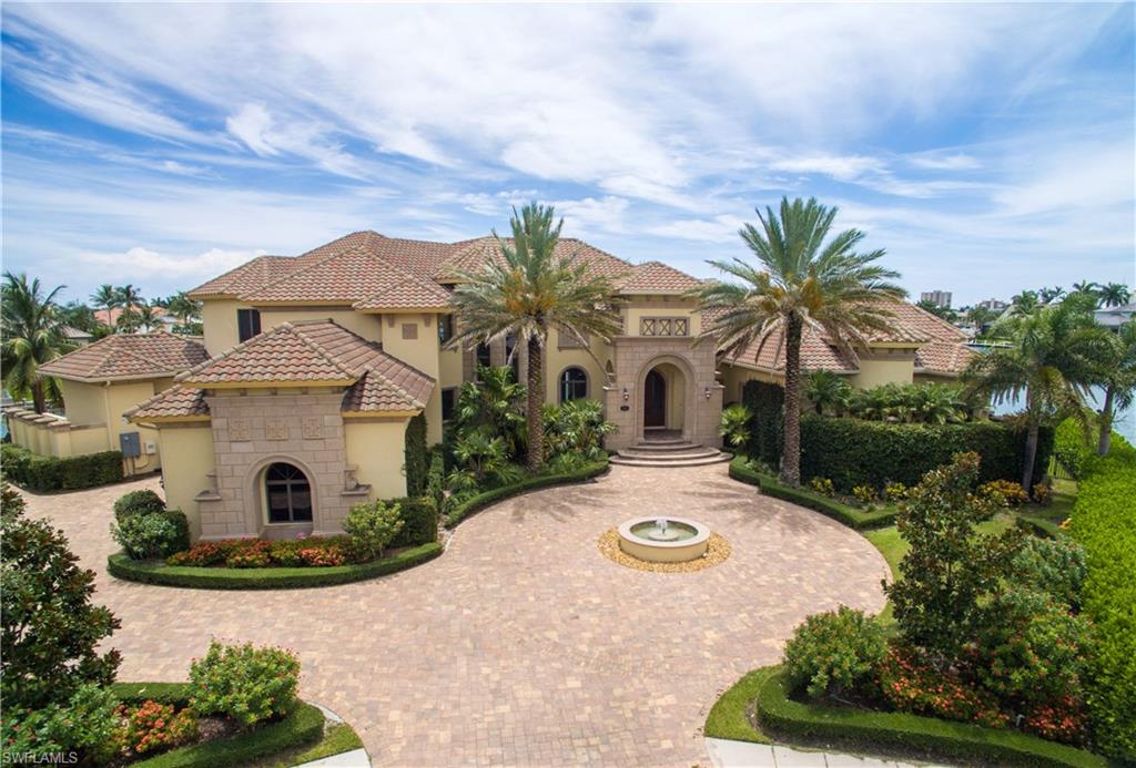 Don’t miss the opportunity to own this GORGEOUS DIRECT GULF ACCESS one of a kind home located on prestigious Marco Island.  Home is located on an expansive salt water basin with intersecting canals, and views to die for.  The open Gulf of Mexico waters can be seen up the canal from the house.  Most any convenience is located just a few minutes drive & the beach is a short bike ride away. This home is a must see and there are simply too many features to list.  The heated infinity pool with overflow spa is the perfect place to enjoy the sunset, while your dinner is cooking on the grill in your outdoor kitchen. Full seawall is in place as well as dock and lift.  No expense was spared in the construction of this house and pictures just don’t do it justice, so call today for your personal tour before it's gone.