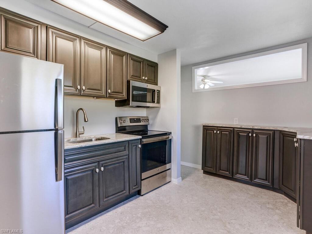If you are looking for a retreat from the cold and snow of the North but don’t want the maintenance hassles that go along with a second home, then this charming 1 bed, 1 bath  newly remodeled condo is perfect for your personal use or as a great investment property.  Located just off Summerlin Rd  you will be close to everything that downtown Fort Myers has to offer, including the Edison and Ford Winter Estates.  You’ll love the convenience of this first floor home with a large walk-out lanai overlooking the well manicured greenspace where you can enjoy your morning coffee listening to the birds sing.  You’ll love the sophisticated kitchen with rich, dark cabinets, granite countertops and stainless steel appliances which is open to the large  great room with tile flooring, which is carried throughout the home. The spacious bedroom is light and bright with convenient  lanai access and a beautifully redone bathroom.