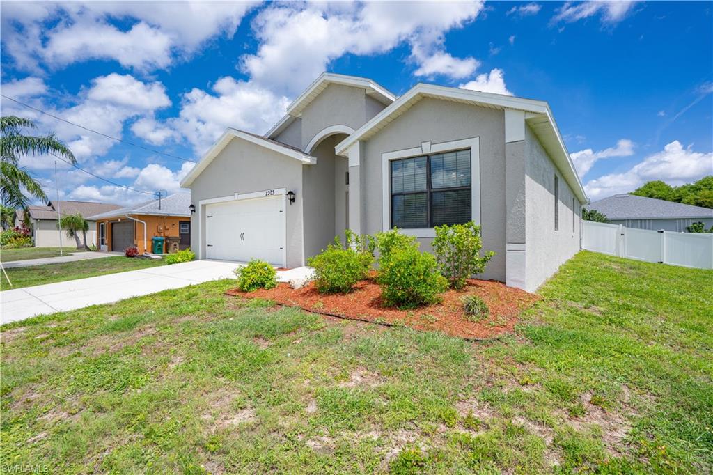 Welcome to your piece of paradise in highly desirable Southwest Cape Coral. Situated in one of the city's most sought-after neighborhoods, this well-maintained home offers the perfect combination of comfort, functionality, and the Florida lifestyle buyers are looking for. Step inside to discover a bright and inviting open-concept floor plan filled with natural light. The spacious living, dining, and kitchen areas flow seamlessly together, creating an ideal setting for everyday living, entertaining guests, or spending quality time with family. The thoughtful layout provides both comfort and versatility for a variety of lifestyles. The primary suite serves as a private retreat, featuring generous space, ample storage, and an en-suite bathroom designed for relaxation. Additional bedrooms offer flexibility for guests, family members, a home office, fitness room, or hobby space. Outdoor living is a standout feature of this property. Enjoy year-round sunshine from the screened lanai while overlooking the spacious backyard. With plenty of room to add a custom pool, outdoor kitchen, fire pit, garden, or play area, the possibilities are endless for creating your own backyard oasis. Conveniently located near shopping, dining, entertainment, parks, golf courses, boat ramps, and world-renowned Gulf beaches, this home provides easy access to everything Southwest Florida has to offer. Whether you're searching for a primary residence, seasonal getaway, or investment opportunity, this property delivers exceptional value in a location that continues to grow in popularity.  Don't miss your chance to own a home in one of Cape Coral's most desirable areas. Schedule your private showing today.