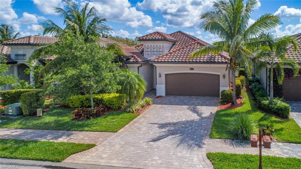 Move in ready! Turnkey furnished 3 bed 3 bath and a den 2,022 square feet 2 car garage former model, golf bundled, Sophia floor plan with a pool, spa & summer kitchen walking distance to the amenities! This home is loaded with upgrades and high-end furniture. Island kitchen with 42 inch cabinets and crown molding, custom woodwork throughout the home, shadow boxes on the walls, coffered ceilings, tray ceilings, beautiful crown molding, walk-in pantry, tile on diagonal with carpet in the bedrooms, 8 foot formal doors and French doors in the den, granite counters and a wood plank ceiling in the lanai. Great room design with the kitchen overlooking the dining and living area. The master suite has a walk-in shower and a tub with custom built-in cabinets in the walk-in closet. The spare bedrooms have their own wing of the house and bathrooms to accommodate guests. Treviso Bay has some of the best amenities in Naples with 8 clay tennis courts with a professional staff, a full-service gym and aerobics with a professional staff, a 50,000 square foot clubhouse, bundled golf, beautiful walking paths and a boardwalk through the preserve. Available to show today!