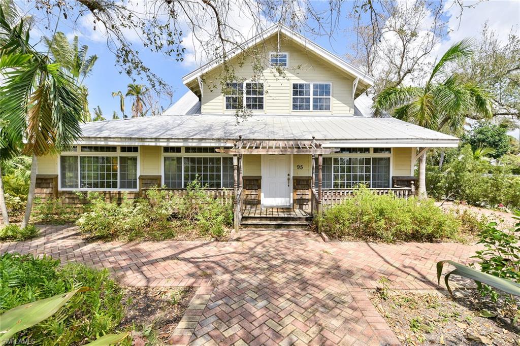 This quaint Old Naples cottage with a one-bedroom guesthouse and a two-car garage is located on the beach block of a charming neighborhood. This prime corner of Gulf Shore Boulevard South and 12th Avenue South is moments to the beach, the pier and the relaxing amenities of Third Street South. Originally built in 1908 in LaBelle, Florida, the house is being sold as-is. The Kentucky hunters and fishermen who built the house came to Naples and saw the pier. They had the house barged from LaBelle to Naples in 1910, sitting it on this property. The house has an antique fireplace, wood floors and deck, wood beam ceilings and a 2013 metal roof. There are endless possibilities for this unique treasure, which could be remodeled to create the perfect beach cottage. You will find alley access, mature oak trees and great homes throughout this special neighborhood.