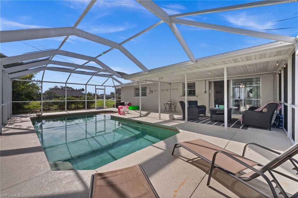 Welcome to this beautifully renovated 3-bedroom, 2-bathroom pool home in Cape Coral, offering the perfect blend of comfort, style, and functionality.

Step inside to a bright open floor plan designed for modern living, with updated finishes throughout and a seamless flow between living, dining, and kitchen spaces—ideal for both everyday living and entertaining.

The home features thoughtful renovations that create a warm and inviting atmosphere, while providing the comfort everyone dreams of! 

Enjoy the Florida lifestyle outdoors in your private pool area with multiple seating spaces, perfect for relaxing, hosting gatherings, or enjoying meals outside year-round.

Whether you're looking for a primary residence, vacation home, or investment property, this home checks all the boxes.

Offered fully furnished and turnkey, it’s truly move-in ready—just bring your suitcase and start enjoying everything Cape Coral has to offer!