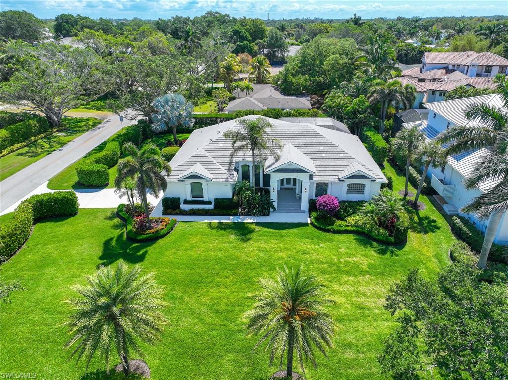 Moorings Remodeled 4 bedroom pool home with access to the private moorings resident beach. Home has not flooded. New roof, Kitchen Appliances, Newer A/C, Impact glass windows, Epoxy garage floor, heated pool, screened lanai, out door shower, extra large master bedroom, Large closet, new large master bath with Separate shower and bath tub, lush mature landscaping, giant front yard with hedge and large hedged side yard. Home is close to the beach.  Easy to show !