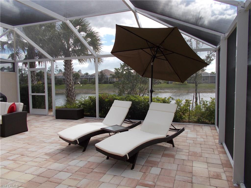 Soak up the Florida Sun and enjoy the long lake view of this 3 Bedroom Two Bath Carrington Model.  The lanai was recently extended with all new custom paving and a retractable awning.  Beautiful plantings are landscaped along the lanai and property.   Custom Plantation Shutters through out the entire home.  Kitchen features granite and stainless steel appliances.  Two car attached garage.  This property has been impeccably maintained by the original owner and is a "must see".