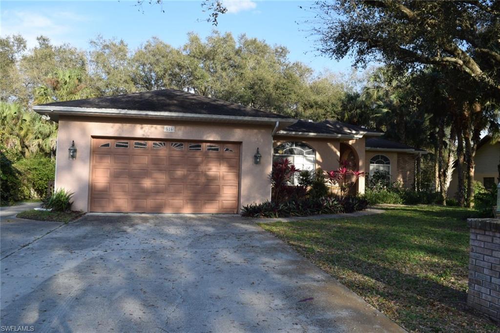 Come and see this beautiful home in a desirable area of Lehigh Acres. This 3 bedroom 2 bath  home is very spacious and has a very nice floor plan. Perfect for a family!   Relax on the screened in back lanai that is surrounded by beautiful trees and lots of shade! Don't miss out on this gem of a home!