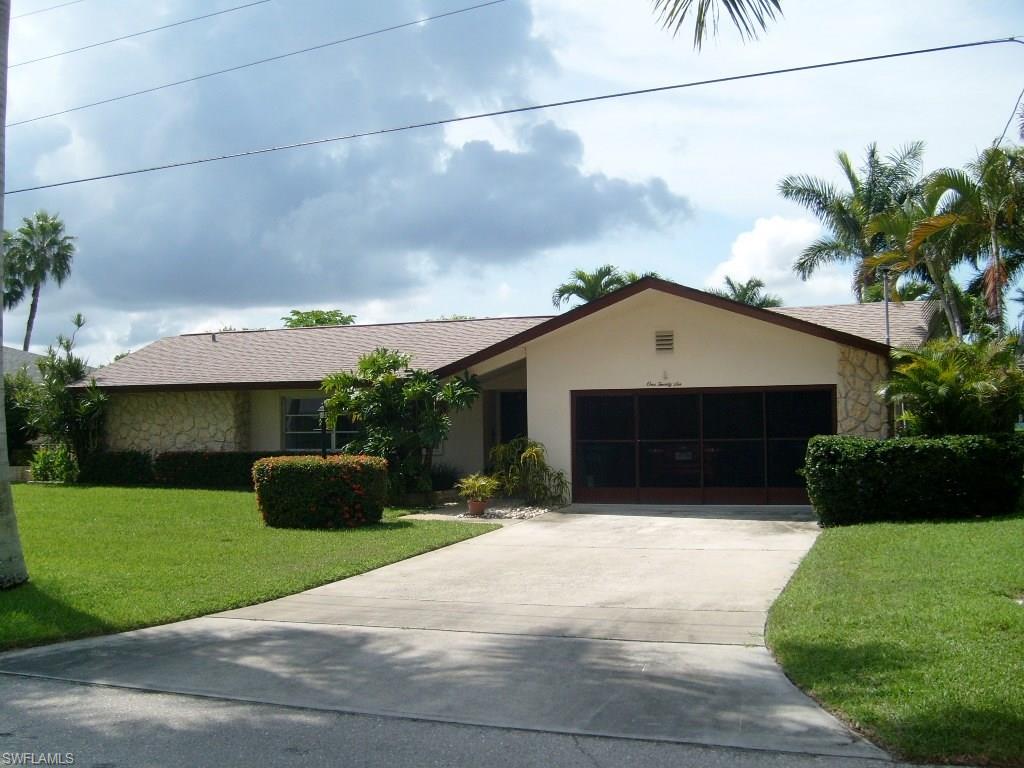 Great opportunity to own a nice canal front home in southwest Cape Coral. Close to river, nice dockage, nice view, well kept with nice landscaping, and newer roof.  Home needs updating on the inside, but has been maintained.