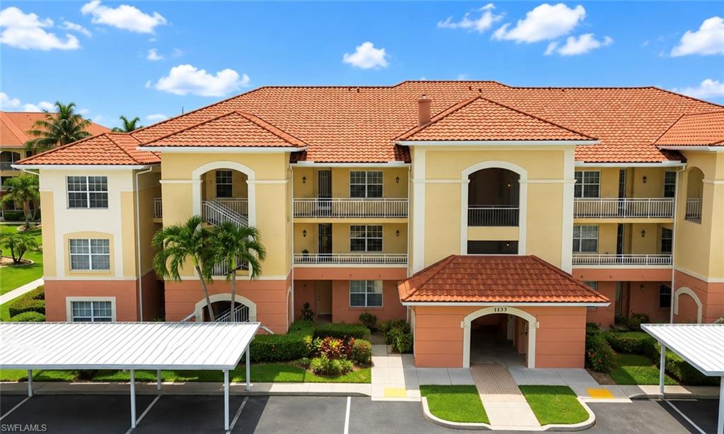 Why wait for vacation when every day can feel like one? Welcome to Van Loon Commons, where resort-style amenities and low-maintenance living come together in one of Cape Coral's most beautifully maintained gated communities.

Van Loon Commons is a Popular Gated Community in the heart of Cape Coral, FL.! This beautifully maintained second-floor condominium offers the perfect combination of comfort, convenience, and carefree Florida living. With nearly 1,400 square feet, this spacious residence features two bedrooms, two full baths, plus a versatile den that easily adapts as a home office, formal dining room, hobby room, or guest space.

The thoughtfully designed split-bedroom floor plan offers privacy for owners and guests alike. The bright kitchen is equipped with stainless steel appliances, generous cabinet storage, pantry, breakfast bar, and a cozy breakfast nook. The open living area flows seamlessly to the screened lanai, creating the perfect place to enjoy your morning coffee or unwind while overlooking the beautifully landscaped courtyard.  The Community Fountain is right below the Screened Balcony and offers a Serene Peaceful Setting for relaxation.

The spacious primary suite features private lanai access, dual walk-in closets, and an ensuite bath, while the guest bedroom and bath are tucked away on the opposite side of the home for added privacy.

Recent improvements provide peace of mind, including impact-resistant windows, newer HVAC system, newer water heater, luxury vinyl plank flooring, and a tile roof. Additional conveniences include elevator access, covered parking, exterior storage, abundant guest parking, and a screened front entry that welcomes refreshing Florida breezes.

Van Loon Commons offers outstanding amenities including a resort-style heated pool, spa, clubhouse, fitness center, billiards room, library, walking paths, and beautifully maintained tropical grounds with tranquil fountains throughout the community. Pet friendly and ideally located close to shopping, restaurants, medical facilities, parks, and easy access throughout Cape Coral and Fort Myers, this move-in-ready condominium is ideal as a year-round residence, winter retreat, or investment opportunity.

Come experience the relaxed Southwest Florida lifestyle you've been looking for.