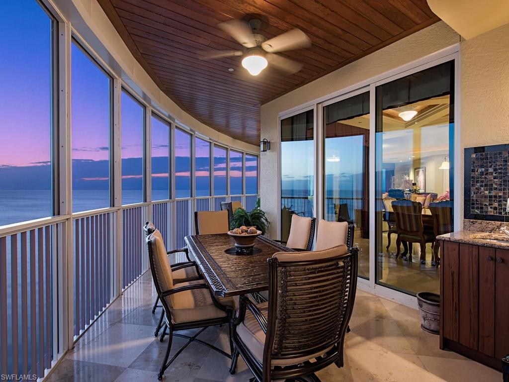 The pinnacle of luxury living is realized in the merging of this stylish retreat with dramatic skyline views over the Gulf of Mexico in Naples' most coveted hi-rise. Enjoy breathtaking vistas like no other of the serene sugar sand beaches and water to the lights and activity of Park Shore only achieved by the 19th floor position and ideal southwestern exposure. Highly customized for the most discerning of owners, the hardwood floors, honed granite and marble countertops and bathroom upgrades are just a few of the finishes to envy. The chef's style kitchen with Wolf and Sub-Zero appliances, island, bar, and sensational views of the Gulf make entertaining a true joy.  The luxurious floor plan features a master wing with dual bathrooms and closets, separate guest quarters with full kitchen, sitting and bedroom and private elevator. Even a steam sauna. Custom built theatre, A/V system, outdoor kitchen and outdoor sitting areas provide every possible benefit. The residents of the Regent are privy to the best in service from the professional management and security. Boat slips are also available for lease or purchase. The Regent 19S simply has no equal for Naples' luxury living.