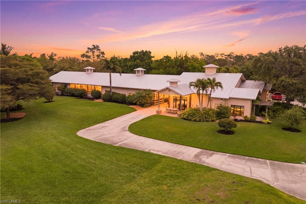 Equestrian Facility, ready for your horses, or set up a working horse business here in Lee County! A beautiful 2 story home with all of the expected appointments and amenities that extenuate equestrian living here in paradise. Training, breeding, lessons, boarding, all discipline's will find this exquisite equestrian facility a true haven for the country life and horses in your backyard. Looking for a facility where your trainer can live, this is it. A full time barn or winter show barn retreat in SW Florida. Convenient to Rt 80 to I-75, the SW FL International Airport and many area show facilities and grounds for the active equestrian life. 10 stall barn with 1/1 efficiency apartment, 1/2 bath for boarders, a separate 4 stall barn and plenty of grass pasture and turnout here. Beautiful attached 3/3 home with upscale amenities and finishes, sit out on the patio and enjoy the views of grazing horses. 1 Dressage and 1 Western arena with correct footings, and quality fencing to protect your horses here at their new home. 
One of the main things that attracted sellers to this property is the location!! This is the absolute perfect location when you live on a ranch. You’re right by everything:  shopping, restaurants, Airports, the interstate, and church.   But then when you drive through those gates of Paradise Ranch, you experience complete privacy!  Your own little piece of Heaven.  You feel like the city is miles away!  You have complete privacy from all your neighbors.  The end of a dead-end road so no traffic whatsoever!  Pure paradise, bring your horses and ride in paradise every day. Additional informational attachments, photos and video available!
