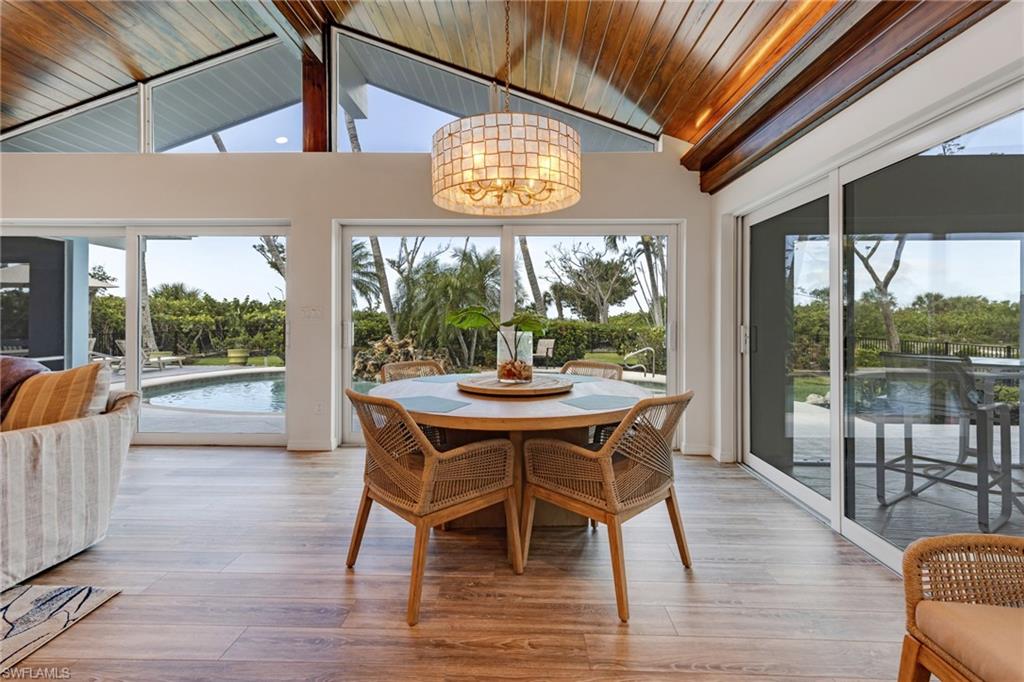 Direct Gulf-Front Beach House on Over 1 Acre – Your Private Island Escape

Nestled on over an acre of serene, lush grounds, this exquisitely redesigned Mid-Century Modern beach house offers unparalleled Gulf-front living. With a meandering path leading to the soft, sun-kissed sands of the Gulf, you’ll have direct access to the water for endless relaxation or adventure.

The home’s rear elevation evokes the charm of a French château, complemented by an expansive outdoor living space perfect for entertaining. Enjoy al fresco dining on the large patio, unwind in the sparkling pool and spa, or bask in the warmth of the spa while taking in stunning sunset views over the water.

Completely remodeled with meticulous attention to detail, this residence boasts a brand-new roof, impact-resistant glass windows and doors, and a pool that will be resurfaced in Summer 2025. Every corner of the home reflects luxury and tranquility, including the inviting main gathering area featuring a vaulted Cypress tongue-and-groove ceiling, new flooring, and three distinctive arches. Expansive sliding doors from each room frame breathtaking views with Western exposure, while chic furnishings create the perfect atmosphere for a true Island retreat.

Set within the prestigious, gated community of Chateau Sur Mer – offering just 70 exclusive home sites – this property ensures both privacy and casual elegance. Whether for personal enjoyment or as an outstanding rental investment (with future bookings to be honored), this home is the epitome of sophisticated yet relaxed beachside living.