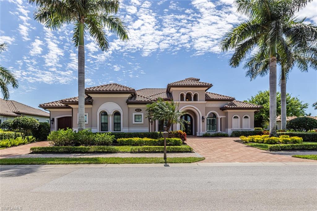 Location, location, location this rarely available Majorca (Diamond Series) model on a private corner lot located in the beautiful Lakoya community has one of the better views in all of Lakoya! This open floor plan allows the owners and guests to enjoy a beautiful view throughout the living room, family room, kitchen, master bedroom and of course the lanai! The southern exposure allows for you to enjoy the pool and spa all day! If you love to entertain, this is the perfect home with a beautiful outdoor natural gas kitchen, bar and fire pit! The interior with its beautiful ceilings, wood and tile flooring, plantation shutters and stainless-steel appliances must be seen to be appreciated. The upgraded California closets are spectacular! A beautiful pool and Spa including a large picture window lanai cage has a beautiful view of a lake and water display! Enjoy tennis, pickleball, bocce, exercise facility, restaurant, beauty salon and spa! In addition to the two public golf courses and one private course! Easy access to either downtown Naples or Marco Island!