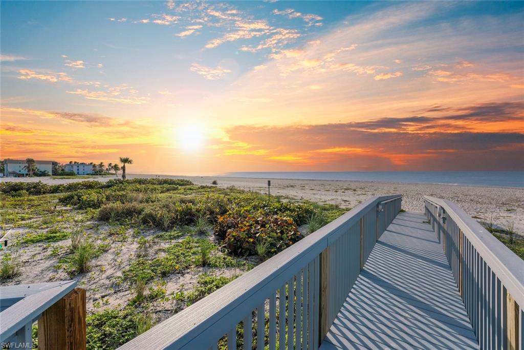 Wow! What a view! Sanibel’s Signature Address for Elegant Gulf Front Living. When you think of the namesynonymous with sophisticated waterfront living on Sanibel, one community always stands above the rest.Wedgewood. Ideally positioned along West Gulf Drive, this premier complex embodies relaxed island luxury andeffortless comfort. Unit 101 is located in the building closest to the Gulf, offering sweeping east-facing panoramicviews—so expansive that on a clear day, you can see all the way to Naples. Add in the unforgettable sunsets, and theviews alone make this residence extraordinary. Inside, the unit is completely brand new—every element has beenreplaced and finished to the highest standard. Features include: Solid oak wood flooring, all new fixtures andplumbing, solid wood interior doors, Thermador appliances, Cambria quartz countertops in the kitchen and baths,custom cabinetry throughout, artistically tiled bathrooms, wet bar with two wine refrigerators, impact resistantwindows and doors, new air conditioning systems and a new roof. Designed with a completely neutral palette, theinterior serves as a stunning, timeless foundation—ready for you to personalize and create your perfect retreat in thesun. Additional storm protection includes exterior hurricane shutters, impact sliders encasing the entire lanai, and asecond set of impact sliders leading into both the living room and primary bedroom. The enclosed den/office withpocket doors offers flexibility and can easily function as a fourth bedroom.The Wedgewood features a serenecourtyard pool, two enclosed parking spaces, and convenient ground-level storage.This exceptional, fullyreconstructed residence is ready for you to simply turn the key and step into the finest Gulf Front living Sanibel has tooffer.