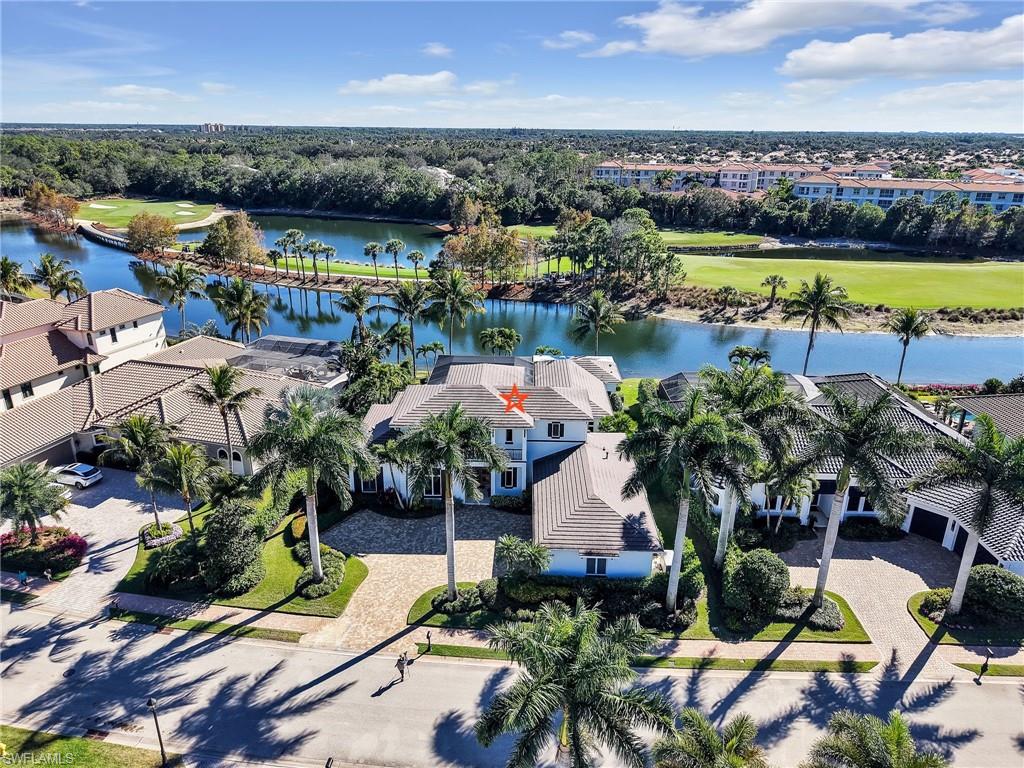 Luxury Estate Living in Marsala at Tiburón in Naples, Florida.  This exceptional residence offers nearly 5,000 square feet under air and 6,777 square feet under roof, set on a preferred southern rear exposure. Thoughtfully updated and impeccably maintained, the home features no carpet throughout, showcasing elegant marble and wood flooring. MANY important and useful updates and improvements have also been completed within the past two years. The expansive floor plan includes 4 bedrooms plus a den, 6 bathrooms (4 full, 2 half), and a huge second floor with two bedrooms, both ensuite plus a HUGE bonus room with its own private balcony, ideal for a media room, gym, or guest retreat. The interior and exterior have been freshly painted, complemented by remote-controlled blinds in the living room and primary suite. Outdoor living is elevated with a refinished pool, brand-new pool cage and newly tiled pool lanai, perfect for entertaining or relaxing year-round. Additional upgrades include two newer A/C systems, a tankless water heater, whole house generator, whole house water softener and more. Located in the prestigious Tiburón Golf Club, home to multiple PGA events, this property offers immediate availability of golf and social memberships with no waitlist, though membership remains optional. Ideally situated just minutes from Vanderbilt Beach, Mercato, and cultural performances at Artis—Naples, this home combines luxury, lifestyle, and location.