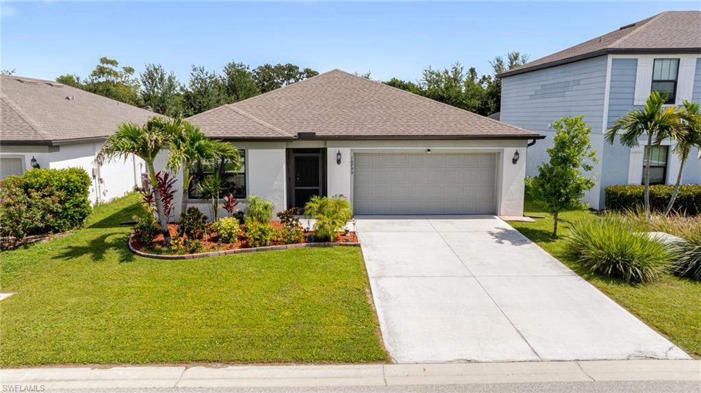 One or more photo(s) has been virtually staged, AI generated or rendered.  Beautifully maintained and move-in ready, this 3-bedroom, 2-bath home with a 2-car garage offers the perfect blend of comfort, style, and convenience. Featuring a spacious open living area, there's plenty of room to relax, entertain, and enjoy everyday living.

The kitchen is complete with quartz countertops, stainless steel appliances, and ample cabinet and counter space. The split-bedroom floor plan provides privacy, while the primary suite features a large walk-in closet, dual vanities, and an oversized walk-in shower. The guest bathroom offers a convenient shower/tub combination.

Tile flooring flows throughout the main living areas, with brand-new luxury vinyl plank flooring in all three bedrooms for a fresh, modern look. Step outside to a fully fenced backyard featuring an extended paver patio—perfect for outdoor dining, entertaining, or simply unwinding. There's even plenty of room to add the pool you've always wanted.

This home has been exceptionally cared for and includes a **2020 water heater**, a recently replaced **A/C motor**, and **new gutters** surrounding the home for added peace of mind. The home has **never flooded**, and the well-maintained lawn adds to its outstanding curb appeal. Furniture is negotiable, making your move even easier.

Conveniently located just 10 minutes from downtown, within walking distance to grocery stores and everyday shopping, and approximately 40 minutes from Southwest Florida's beautiful Gulf beaches, this home offers the perfect combination of location, comfort, and value. Don't miss your opportunity to make it yours—schedule your private showing today!