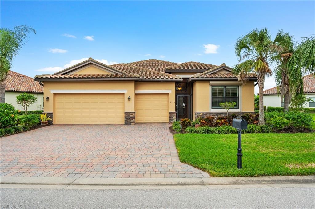 This is it - Your Florida Dream Home! Situated on an oversized pie-shaped lot, this desirable home provides ample distance between neighbors for privacy &/or outdoor entertainment. Offering nearly 2300 sq ft under-air, it features an expansive great room that opens to the heated pool and spa, & overlooks a community lake for peaceful relaxation. The kitchen is a chef's dream with cabinets & counterspace galore, along with a separate pantry, center island with seating, breakfast bar, SS appliances, & granite countertops. Perfect for entertaining, it flows into the abundant great room & formal dining room areas. The built-in desk/credenza allows the breakfast nook to double as an office space. The primary en-suite features a luxuriously remodeled bathroom with double sinks & high-grade granite, expansive open shower, & enormous walk-in closet. Three additional bedrooms are split, offering family/guests a private retreat, & feature closet systems in each room. New A/C in 2019! Reflection Isles is a quaint & friendly community, privately nestled along the Six Mile Cypress Slough, allowing for beautiful wildlife to be seen regularly. Schedule your tour today! AGENTS, see remarks please.