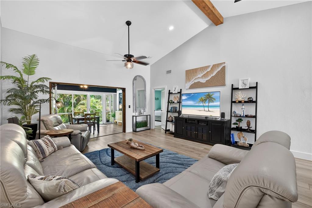Come Discover this waterfront property with Direct Access to the Caloosahatchee River! Enjoy maintenance-free living in this beautifully updated 2-bedroom, 2-bath with a detached 2-car garage in the charming hidden secret in the Village at Indian Creek within Riverbend. Surrounded by lush green space and nature, this unique community offers free boat docks, kayak access, and navigable water access to the caloosahatchee river and to the Gulf. The private courtyard provides the perfect space for relaxing or entertaining, while the enclosed lanai/sunroom showcases tranquil views of the creek, mangroves, and preserve through new sliding glass doors. Inside, the open great room features cathedral ceilings, and abundant natural light. Recent updates include a newer  roof, windows, updated bathrooms, A/C, water heater, kitchen appliances, with LVP throughout. Residents enjoy a community pool and an exceptional HOA package that includes hazard and flood insurance, roof repair and replacement, lawn care, irrigation, pest control, water, sewer, trash removal, and more (see Highlights Sheet for details). Conveniently located just minutes from I-75 and Downtown Fort Myers, this updated waterfront condo/villa offers the perfect blend of comfort, nature, and the Southwest Florida boating lifestyle. Schedule your private showing today!
