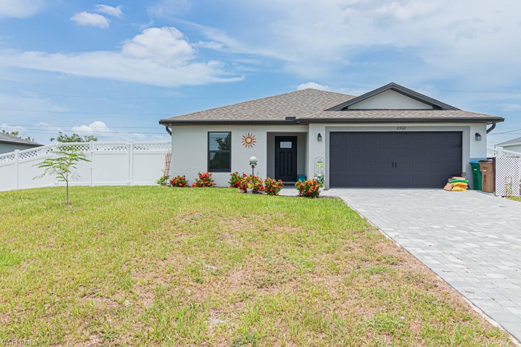 Nearly new three-bedroom, two-bath home located in Northwest Cape Coral. This beautiful property features an open-concept floor plan and numerous upgrades that are sure to appeal to today’s buyers.

The spacious primary bedroom offers plenty of room for large furniture and includes a private bathroom and walk-in closet. The two additional bedrooms are generously sized and conveniently located on the opposite side of the home for added privacy. The kitchen features a large island with seating, stainless steel appliances, a pantry, abundant cabinet space, and plenty of counter space. A separate dining area provides additional room for meals and entertaining. The two-car garage offers extra storage space, and the owners recently installed a new vinyl fence. Conveniently located near shopping, dining, and everyday necessities, this home offers comfort, style, and an excellent location.