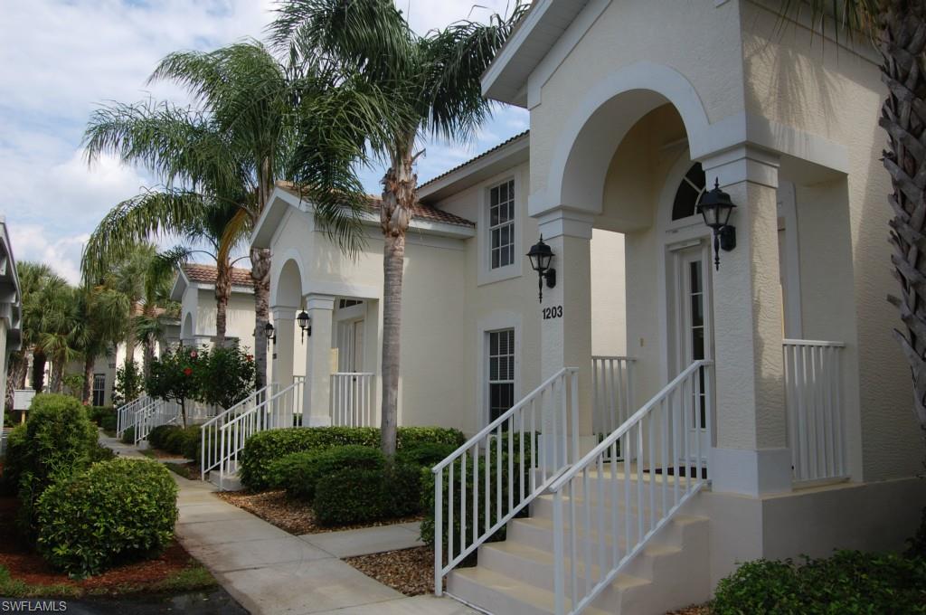 Enjoy the beautiful sunrises over the water while relaxing with your morning coffee and watching the Florida  birds !  This is the perfect time to buy that 2nd vacation or retirement home.  Master bedroom boasts beautiful lake views also.  Separate 2nd bedroom and bath for guests.  Large living/dining area with eat in kitchen.  Mural and paintings seen are by the talented owner.  Covered carport with storage for bikes and pool accessories.  Country Club living with 18 hole Golf course, 10 Tennis courts/Pickle ball, 7 Pools/spas, State of the art Fitness center, Restaurant with weekly entertainment, Nature trails, Library, Community room, & Walking trails.  This home is on the pay as you play golf side of the community which affords a discount off public rates.  Close to airport, Red Sox & Twins training camps, shopping, hospitals, and restaurants.  Come and live the Colonial Country Club lifestyle ... you will never be bored !