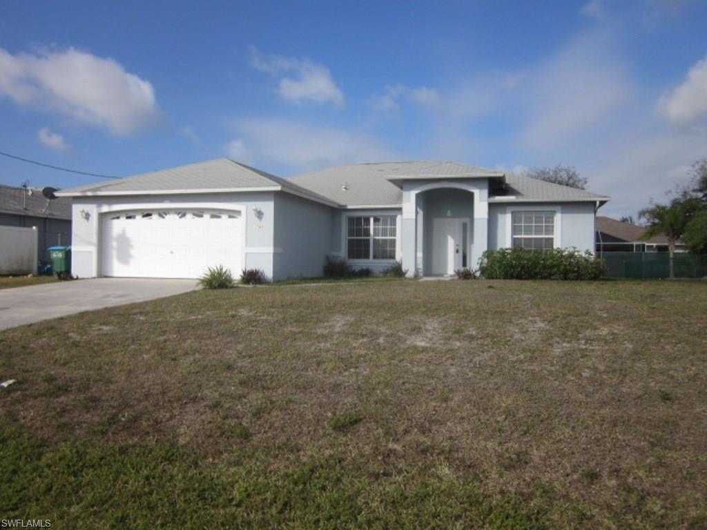 Great 3 bedroom, 2 bath home with open floor plan ready to move in.  New stainless steel appliances in kitchen.  Hard surface floors throughout.  Large tiled lanai.  This is a wonderful location, beautiful library just steps away.  Close to shopping in a wonderful SW location.