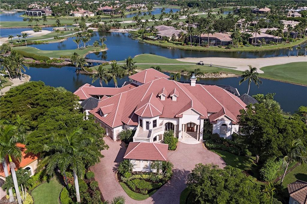 This rarely available custom estate home has recently undergone an extensive renovation and resides on one of the premium panoramic lake/golf view homesites in all of Grey Oaks. The over 7,000 square foot six-bedroom plus den estate includes approximately 250 feet of lake frontage and is nestled in the exclusive Isle Toscano neighborhood. Nearly every room overlooks a wide long-range lake and golf course view including three golf holes of the tropical Palm Course. A completely renovated gourmet kitchen opens to a large dining area and spacious family room with dual 10-foot pocketing sliders overlooking the magnificent view. A considerable outdoor screened covered living space includes a summer kitchen, bar, infinity-edge pool with shallow splash pad and raised spa. The spacious owner's suite includes a marble adorned bath, dual closets and an adjacent sitting area. Additional features include a detached guest cabana, second-floor lounge, warm study with gas fireplace and a four-car garage. A world of luxury awaits you in the award-winning Grey Oaks Country Club that has recently completed a multimillion-dollar renovation.