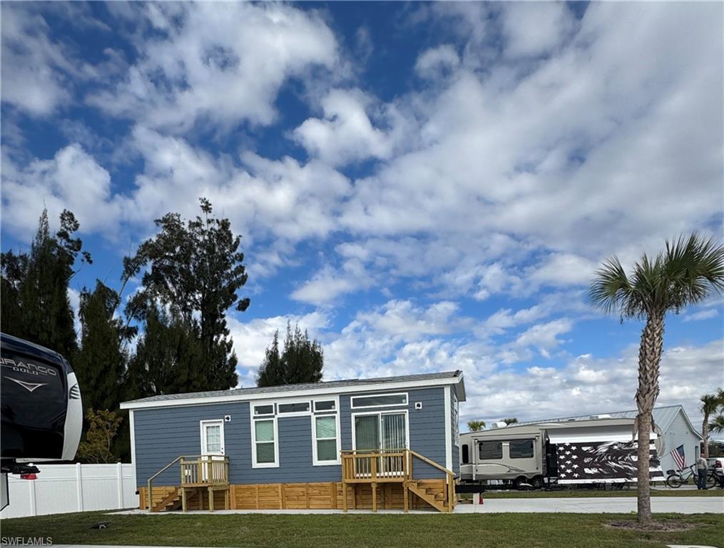 Welcome to Lot 358 at Palm Breeze RV Resort, where effortless Florida living meets flexible ownership. Here is where space, privacy, and convenience come together. This oversized RV lot measures 40 x 80, offering approximately 3,200 square feet—providing plenty of room to personalize your outdoor living area with a tiki hut, outdoor kitchen, expanded paver pad, upgraded landscaping, and more to create your own resort-style retreat.

This beautifully positioned site features a park model cottage offering the blend of comfort, convenience, and and resort-style lifestyle.  Step into a thoughtfully designed space that allows you to unwind, relax and entertain - all within one of southwest Florida's newest RV resorts.

This well-positioned lot backs directly to a privacy fence, creating a quiet and secluded rear setting ideal for relaxing or entertaining. Located directly across the street from resort amenities, you’ll enjoy easy access to the clubhouse, pool, and community gathering spaces while still maintaining a peaceful and private atmosphere at your site.

Surrounded by beautifully maintained grounds, Lot 358 offers the perfect balance of accessibility and tranquility. Whether you’re seeking a seasonal escape or an investment opportunity in one of Punta Gorda’s newest luxury RV communities, this property presents a prime opportunity.

Palm Breeze RV Resort is conveniently located near Punta Gorda Airport, Interstate 75, shopping, dining, and waterfront attractions, and is just a short drive to Fort Myers and Venice.