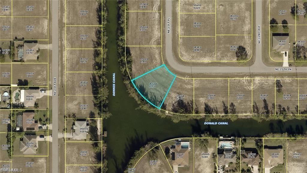 SPECTACULAR CUSTOM NEW CONSTRUCTION SITUATED ON AN OVERSIZED LAKEFRONT LOT (123 FEET OF WATERFRONT) WITH LONG AND WIDE LAKE VIEWS (TYRE LAKE) !!!!!!!! (PLUS, VIEW STRAIGHT DOWN JARKO CANAL) This 4/2/2 property has over 2000 sq. ft. of living area. High-impact glass for all windows and sliders. Brand new seawall installed. Grand 12-foot front entry with double doors. Upgraded tile throughout the property. Huge master bathroom with separate tub and walk-in shower. His and her walk-in closets. Brick paver driveway and pavers in the rear lanai. Granite countertops throughout. Solid wood cabinets. Bright and open great room design with breakfast nook, breakfast bar, and dining room. Extra-large lanai under truss. Shingle roof. Floritam sod and irrigation system. Under construction.