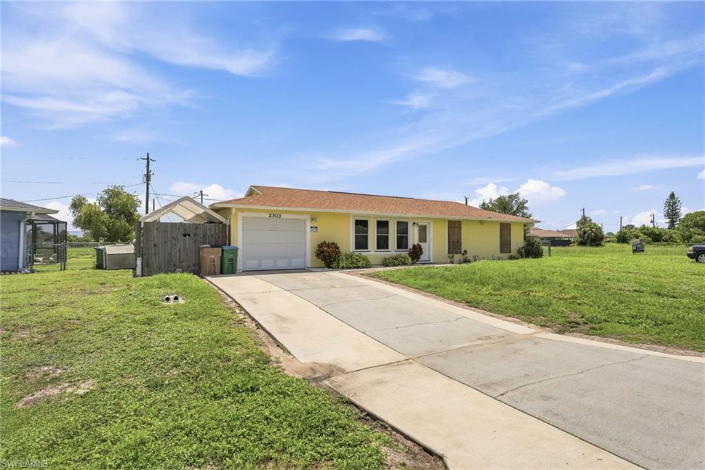 Move right into homeownership with this well-maintained 3-bedroom, 2-bath home offering a comfortable layout and everyday functionality. The open living and dining areas provide a welcoming space for relaxing or entertaining, while the kitchen offers ample cabinet and counter space for daily living. The split-bedroom floor plan provides added privacy, with a spacious primary suite featuring a walk-in closet and private bath. Enjoy a large backyard with plenty of room to garden, play, or create your own outdoor retreat. An attached 2-car garage offers additional storage and convenience. Located in a growing Northeast Cape Coral neighborhood with easy access to shopping, dining, schools, parks, and major roadways, this property is an excellent opportunity for first-time buyers, seasonal residents, or anyone looking for an affordable place to call home.