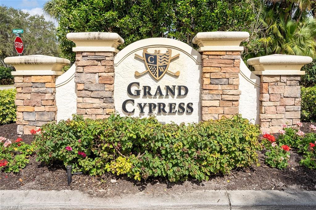 Experience luxury living in this sought-after 3-bed, 2-bath coach home w-2-car garage, nestled in the prestigious Grand Cypress subdivision of Cypress Woods Golf & CC. Unwind on your screened-in Lanai as you watch golfers pass by and take in the breathtaking daily sunsets from the second-floor vantage point with western exposure. Cypress Woods is an exceptional community, boasting a bundled golf membership that grants access to the renowned Gordon Lewis golf course. The recently renovated clubhouse offers an array of member activities, ensuring there's always something to enjoy. Delight in the delectable food and beverage offerings available in the main dining room, the popular Grille Room, the inviting patio, and even poolside service. This vibrant club is known for its golfing opportunities, half-price margaritas, member socials, and the ever-growing popularity of pickleball. Indulge in the finest bowl of Clam Chowder in Naples, and then tee off on the remarkable golf course—truly the best of both worlds. Don't miss the chance to call this exceptional home yours. Come and discover the harmonious blend of upscale living and recreational amenities that await you at Cypress Woods.