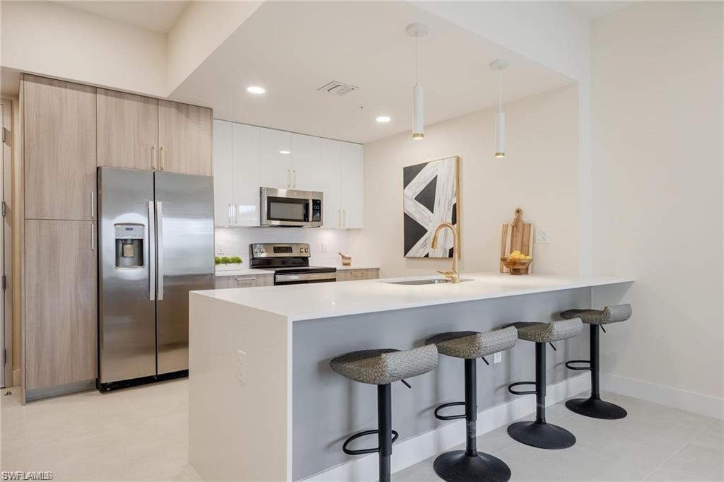 Only 6 New Construction Condos! Don’t miss this opportunity to own one of the last available residences in the newest community at Bonita
Fairways, just completed fall of 2024! LOW HOA! Just 5 miles from Bonita Beach, this community offers the perfect combination of coastal
proximity and peace of mind, situated in a NO FLOOD zone for enhanced safety and security. Among the remaining units is the Cypress layout,
our most spacious floor-plan in the entire community and the only corner unit! This thoughtfully designed 3 BR condominium spans 1,616 sq.ft
and is located within a modern 4-story building constructed to meet the latest & safest building codes. The Cypress is filled with premium
features, including: •Spacious screened-in balconies •Storm-resistant impact windows •Modern kitchen with quartz countertops, stainless steel
appliances, designer cabinetry, under-cabinet lighting, and a waterfall island •En Suite Master Baths with Dual Vanities & Sinks •Energy Efficient
A/C, Heat, Windows and Insulation •Washers and Dryers Included. Big bonus: The building’s first floor is dedicated to covered parking, with
convenient elevator access directly to your unit floor. Plenty of guest parking options available. Botanika is surrounded by an expansive nature
preserve, home to protected trees and native turtle species, ensuring a harmonious integration with the natural environment. Enjoy exclusive
access to a resort-style pool, spa, and resident’s pool cabaña in addition to Bonita Fairways’ extensive community amenities which include an
other resort-style pool, spa, tennis courts, pickle-ball, bocce ball, state of the art fitness center, gated entry, and more. Significant perk: Enjoy
the privately owned 18 hole public executive golf course located within Bonita Fairways (no mandatory memberships). Designed by Gordon
Lewis, Bonita Fairways is a par 61, 3500 yard golf course perfect for all ages and levels of golfing! The natural beauty of the nature preserve
and abundance of lakes that surround the course challenge your short game as well as your long game! Enjoy a full size putting green to
practice your short game before heading out, a fully stocked pro-shop, and after your round stop by the Bobcat Café for a cold drink and
delicious meal! The highly profitable golf course significantly contributes to the community budget, supporting ongoing repairs and
enhancement of amenities. This includes plans for upcoming additions, such as a 2nd pool at the clubhouse, further enriching the community
experience! Bonita Fairways is an active community with activities and events all year round. Situated just minutes from the stunning beaches
of Bonita Springs and Naples, this exceptional location offers unparalleled convenience. Enjoy easy access to upscale shopping, dining at The
Promenade and Coconut Point mall, as well as a variety of entertainment options just within a short drive or bike ride