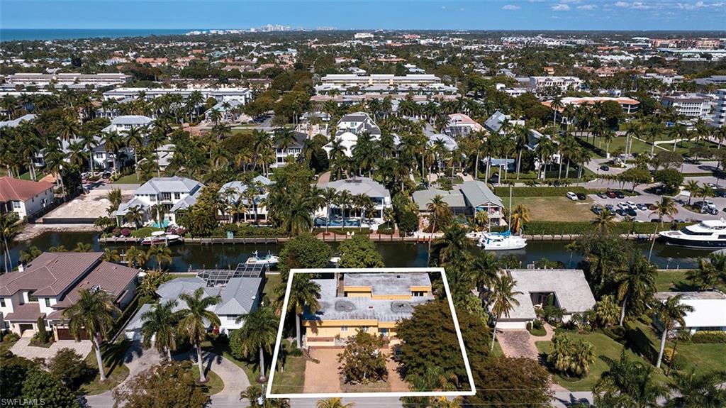 Located in the quiet waterfront neighborhood of Aqualane Shores sits this opportunity to build your direct waterfront dream home! Located on the quiet, quaint Avenue of 15th South, this beautiful 13,000 square foot lot, allows a footprint of 7,000 +/- square feet providing ample space to create your vision! 
The neighborhood of Aqualane Shores is an amazing walking waterfront community downtown with easy access to historic Third Street South's shopping and dining, as well as the sugar sand beaches and the Gulf of Mexico!