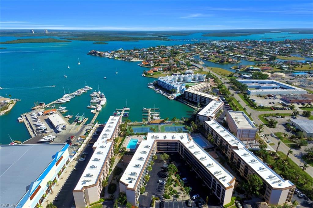 Enjoy fantastic views of Factory Bay and the Marco River in this 1  bedroom waterfront condo with screened lanai! You will discover great value in this top floor updated condo offering an open floor plan and large master suite. Explore active condo living offering resort style amenities at Angler’s Cove including two heated swimming pools, three spas, waterfront restaurant with tiki bar and vehicle wash station. Bonus! You are just a few miles from Marco Island’s crescent beach. Weekly rental opportunity makes this condo an investors dream and fantastic personal getaway!