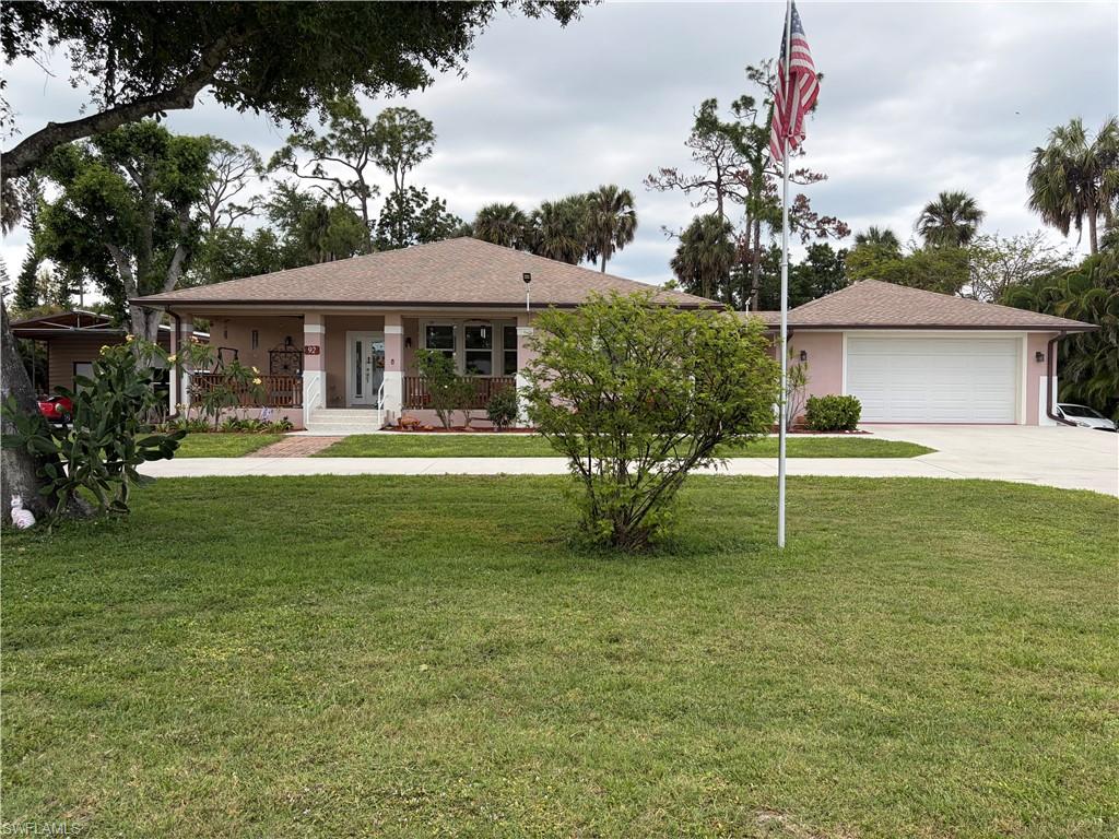This is the Engineer's Estate. The 2020 construction by the owner was meticulously planned. This land size DOMINATES much smaller neighbors. A LUXURY HOUSE and GARAGE ...AND a BONUS STRUCTURE! Don't miss this unique opportunity to own your own Compound right in the Heart of North Fort Myers! 0.9 of an ACRE means you can barely see the 30' X 33' Pole Barn in back. Yes, there is hard work going on inside it with the 10,000 Lb. Lift, and the 80 Gal. Air Compressor (A mechanic's dream); but don't worry, it's insulated with COLD A/C! So, what will you do with the pole barn? Keep the work going? Turn it into an EXTRA SLEEPING AREA? ...A STUDIO? ...STORAGE UNIT? The possibilities are endless. Conveniently located between New 41 and Old 41. The new sealed driveway is just for you. Border trees are included, as well as the 5 fruit trees. 

Come check it out before its gone ! ! !

 ------------------------------------------------------------------------------------------------------------- BONUS UPGRADES: ----------------------------------------------------------------------------------------------------------------------------
**  30' X 33' Pole Barn
**  14' X 30' Shed with Urethane Foam
**  House has 9'2" Ceilings
**  All Doors and Windows Impact Resistant
**  Interior Doors are ADA Handicap 30" Wide
**  4 Corner Security Cameras
**  Flag Pole with Solar Light
**  Back Lanai has 2 Roll Out Awnings  8'5" X 24'
**  Washer / Dryer / Freezer / Dishwasher / Refrigerator
**  Rear Deck has New Composite Wood
**  Front and Back Porches have new Epoxy Lifetime Warrantee's
**  Master Bedroom Closet is so big it can be converted into a Spare Room.
**  Dedicated Generator Outlet