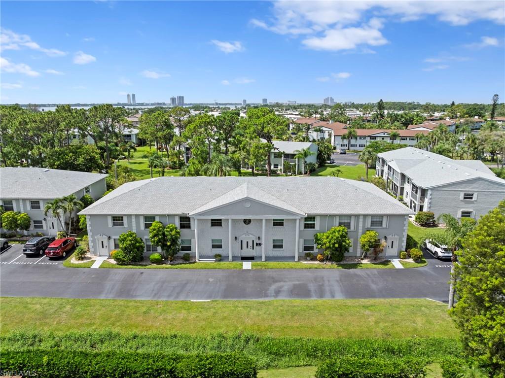 Don't miss this opportunity to own a beautifully renovated first-floor condo in the charming and affordable Nantucket Commons (formerly Foxmoor II), an active 55+ community. This tastefully furnished, turnkey residence features elegant porcelain tile flooring throughout, impact-resistant windows and sliding glass doors and a stunning remodeled kitchen with unique granite countertops, stainless steel appliances and attractive wood cabinetry. Stay comfortable year-round with the high-quality Trane A/C system or relax on the screened lanai overlooking beautifully manicured grounds. Additional features include electric hurricane shutters on the lanai, an in-unit washer and dryer, new water heater and solid aluminum entry door with Ring doorbell for added security. Residents can enjoy the community pool, picnic area and shuffleboard. Please note that dogs are not permitted. Ideally located just minutes from restaurants, shopping entertainment and the vibrant Downtown Fort Myers River District, this move-in-ready condo offers carefree Florida living at an exceptional value.