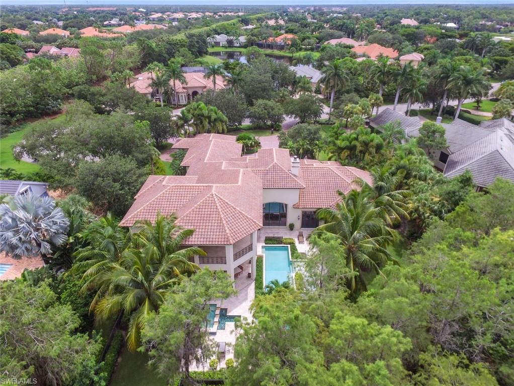 Expansive 6,231 square-foot home on oversized lot in prestigious Grey Oaks Country Club featuring four bedrooms, den, four full baths and two half baths. This two-story residence, built in 2008 in The Estates at Grey Oaks, is ideal for an owner who values space and luxury. The plush lifestyle begins with a sprawling master bedroom complete with morning kitchen and his and hers walk-in closets. Sub-zero, Wolf and Meile kitchen appliances along with programmable lighting and formal den with french doors leading to the pool area offer a luxurious amenity experience. With a stunning formal dining room, summer kitchen and pool deck, and an exterior fireplace, this home is perfect for entertaining.  Grey Oaks offers 54 holes of Championship golf, brand new state of the art fitness / wellness center, resort style pool and dining facilities.