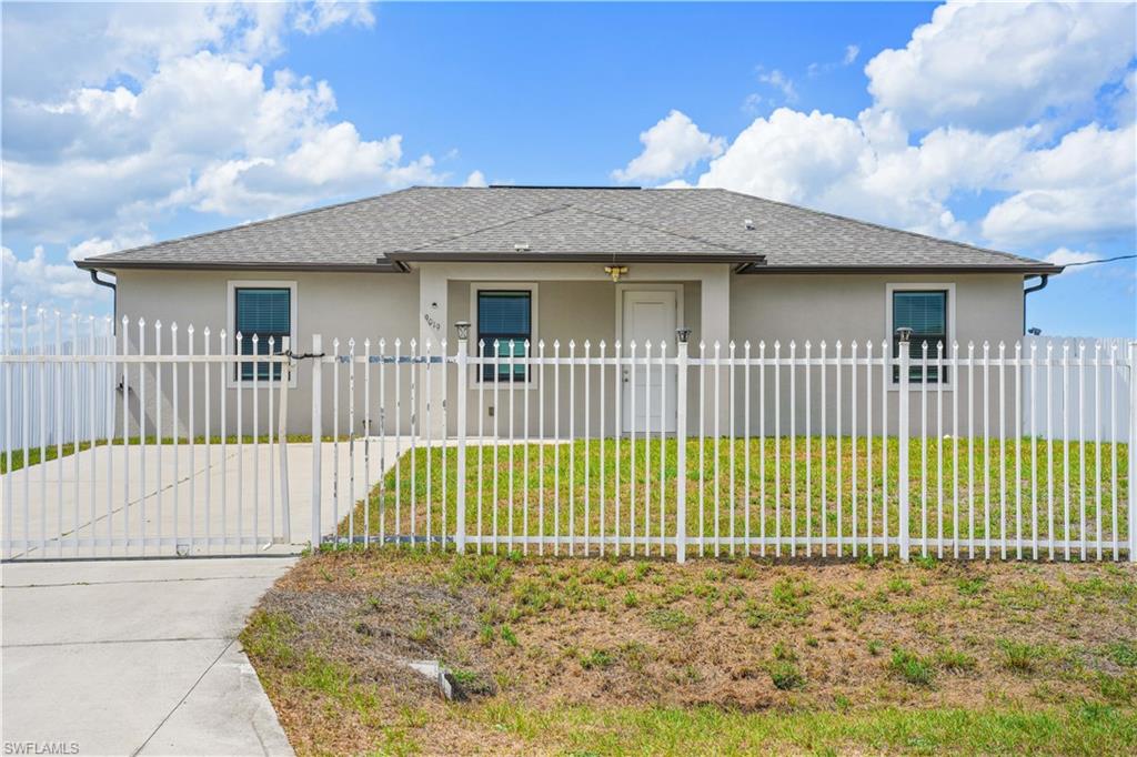 Welcome to this beautifully designed newer-construction home offering an open-concept layout, soaring ceilings, and stylish finishes throughout. The spacious kitchen features white cabinetry, stainless steel appliances, ample counter space, and a large breakfast bar overlooking the main living area, creating the perfect space for entertaining or everyday living. The home also features modern bathrooms with floor-to-ceiling tile accents, durable wood-look flooring, and an abundance of natural light.

Step outside to enjoy the fully fenced yard, providing privacy, security, and room for pets, outdoor gatherings, or future additions. Whether you're a first-time homebuyer, growing family, or investor, this move-in-ready property offers comfort, functionality, and low-maintenance living.

Conveniently located near schools, shopping, dining, and local amenities, with easy access to neighboring communities including Fort Myers, Clewiston, Immokalee, and Lehigh Acres. Enjoy the benefits of small-town living while remaining close to employment centers, recreational opportunities, and Southwest Florida's beautiful Gulf Coast attractions.

Don't miss this opportunity to own a beautiful home in one of Southwest Florida's growing communities.