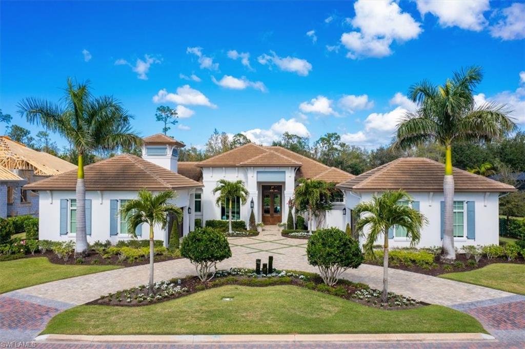 H8658- Newly built in 2020 by Seagate, this extraordinary custom estate home checks everything on your list, including the ability to move into a new home now! With refined luxury at every turn, it is the perfect blend of ultra-high-quality materials and style. Features include all marble surfaces, Legno Bastone French oak floors, John Richard and Visual Comfort lighting, Anderson windows, Schumacher wall coverings and Rohl fixtures. The gourmet kitchen is flanked by an open butler’s pantry and display cabinetry. It features custom cabinetry, loads of storage, 2 islands, Shaws of England sink, Lacanche oven/range with electric & gas ovens, induction & gas burners, warming cabinet and a bonus French burner. The inviting lanai, with outdoor kitchen and bar, has both retractable screens and storm shutters and a combined preserve and long view of the 9th hole of the QW Preserve course for privacy and views. The bespoke quality you see blends with features you can’t, such as Quiet
Rock double drywall with silence membrane and dehumidifier systems. A whole house generator, steam shower, 4-car garage, integrated sound system, two courtyards and custom built-ins complete this stunning home