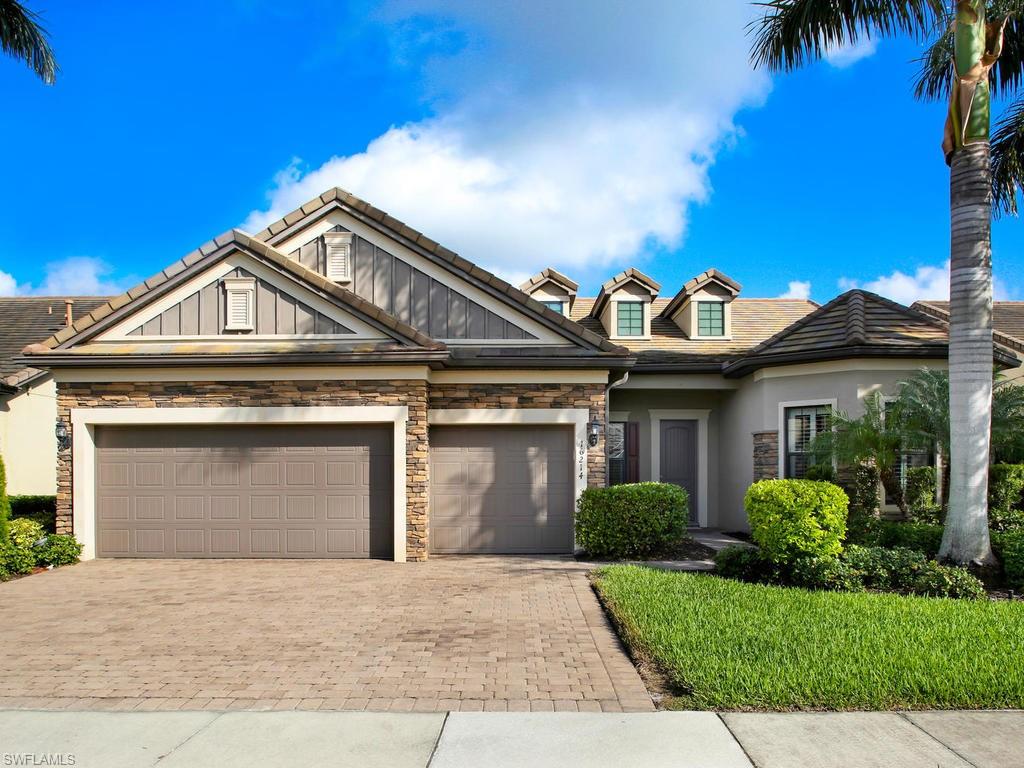 You'll take comfort in knowing that this home, its roof, and all appliances are only 5 years young! LET ME INTRODUCE YOU TO THE HOUSE OF MORE! 2615 sq ft home with 3 large bedrooms, 3 full baths, den, & 3-car garage. WANT MORE? Gourmet, chef's kitchen with huge center island, high-end Kitchen Aid appliances, natural gas cooking, endless cabinet space, & large pantry in this open-concept home featuring soaring, coffered ceiling & upgraded tile. STILL MORE? Indoor & outdoor living become one with zero corner sliders making this the perfect home for entertaining because…wait… there is also an outdoor kitchen with top-of-the-line Lynx grill on the home’s natural gas line, a 2nd full-size French door refrigerator, sink & cabinetry. IT DOESN’T STOP THERE! Relax or entertain your guests on the massive screened lanai complete with upgraded paver deck, huge pool & spa with waterfall feature (pool and spa are heated by natural gas) overlooking the tranquil lake setting. YES, THERE’S EVEN MORE! Spa-like master bath with giant soaker tub, granite counters, double vanities, glass enclosed showers in all 3 bathrooms, & tons of closet space!