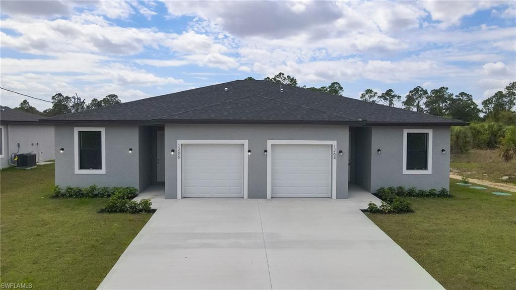 Welcome to this stunning brand-new duplex located in the highly desirable area of Lehigh Acres!
This unit features 3 spacious bedrooms and 2 full bathrooms, thoughtfully laid out with open-concept living and dining area. The kitchen boast stylish cabinetry, sleek countertop, and stainless-steel appliances, making it a chef's dream. Durable vinyl flooring runs throughout, combining elegance with easy maintenance. The property sits on a generously sized lot, offering ample outdoor space for relaxation, gardening, or
entertaining. Its prime location provides a peaceful residential vibe while remaining conveniently close to schools, shopping, dining, and easy access to major roadways. Don't miss this incredible opportunity to rent a brand-new duplex in a rapidly growing area. Schedule your private showing today! **Conditions and restrictions apply.