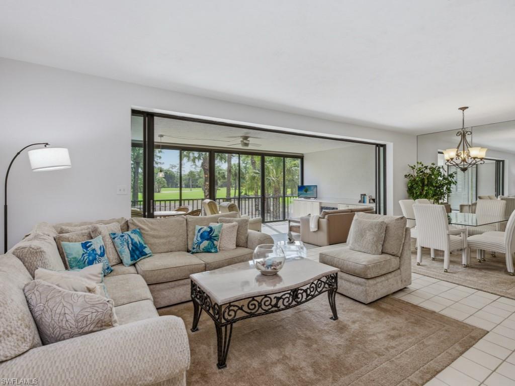 Golfing Privileges Available!  Take advantage of the club's exclusive social golf program, offering immediate golf access to those who join the full golf membership waitlist.  Experience the country club lifestyle you've always dreamed of in this charming condominium located within the highly sought-after Eagle Creek Golf & Country Club. As you travel through the community's picturesque, tree-lined streets, you'll arrive at this warm and inviting residence featuring a light-filled, spacious great room, a private owner's suite, a comfortable guest bedroom, and an enclosed lanai.  Relax and unwind on the sun-filled lanai while enjoying lush tropical landscaping and stunning golf course views. Meticulously maintained and move-in ready, this home offers the perfect opportunity to embrace the exceptional lifestyle and amenities of country club living.